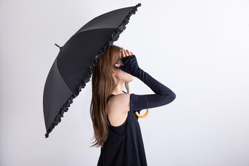 日傘をさす女性　Woman with a parasol