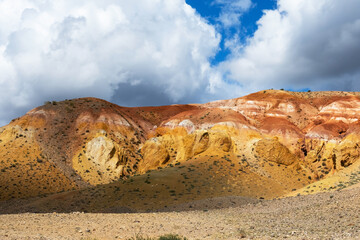 Colorful hills in Altai Republic, named Mars 1. Nature environment background. Natural colored texture of sandstone Martian landscape in Altai Mountains.