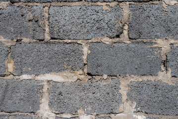 Gray hollow brick wall. Perfect for background.