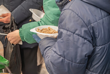 feeding homeless military refugees who fled their homes during the bombing of civilians