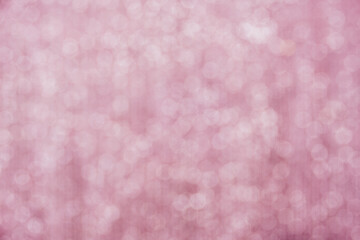 Pink bokeh circle abstract shining background. Blurred glittering wallpaper.