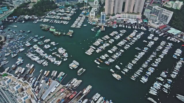 Panoramic aerial view of typhoon shelter made with hundreds of boats in Aberdeen, Hong Kong.