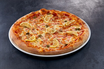 fresh pizza on the white plate