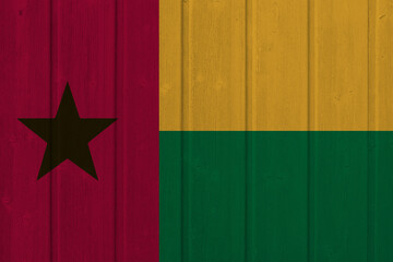 World countries. Wooden background in colors of flag. Guinea- Bissau
