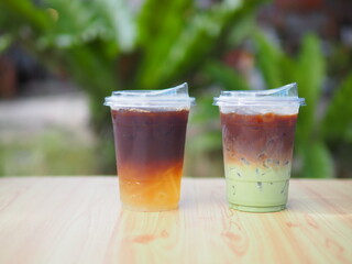 Iced coffee mixed with orange juice, two tones layer decoration.