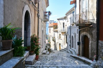 A narrow street between the old houses of Guardia Sanframondi, a village in the province of Benevento, Italy.