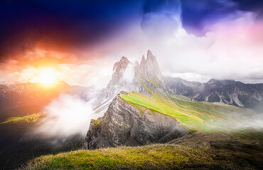 Seceda mountain near Ortisei in Dolomites. Beautiful italian landscape in Trentino. Clouds origins...
