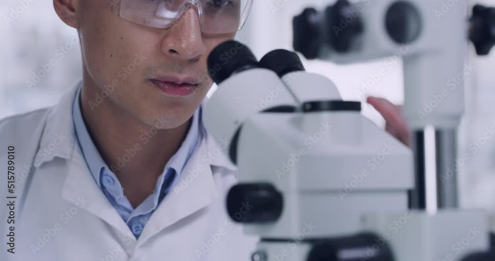 Aufkleber scientist uses a microscope and micropipette dropper to mix fluids in a petri dish test sample. spec