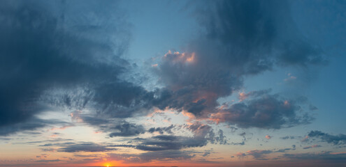 Obraz na płótnie Canvas Fantastic thunderclouds at sunrise