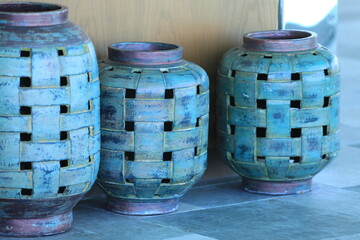 decorative blue ceramic vases on the floor