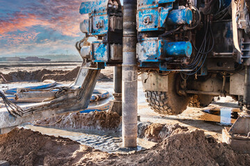 Close-up of a car-based drilling rig at a construction site. Drilling deep wells for mining.....