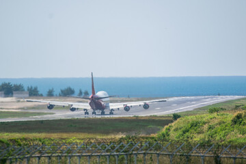Fototapeta na wymiar airplane will take off from runway to sky