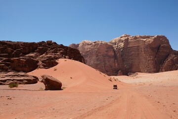 Fototapeta na wymiar Amazing Martian scenery of Wadi Rum desert with rocks and red dunes in Jordan.
