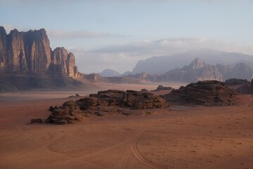 Amazing scenery of Wadi Rum desert looks like Mars. Jabal Al Qatar mountain on horizon.
