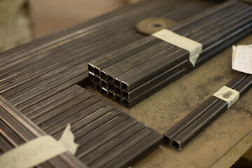 Steel profile in workshop. Rod made of metal.