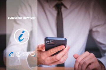 Businessman holding smartphone to contact the customer support