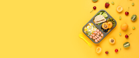School lunch box with tasty food on color background with space for text