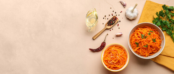 Bowls with spicy Korean carrot salad on light background with space for text