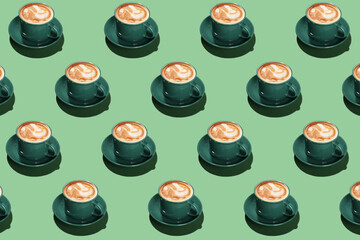 Many cups of hot coffee on green background. Pattern for design