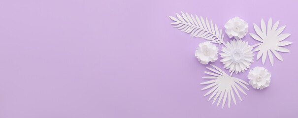 Composition with beautiful paper flowers and leaves on lilac background with space for text