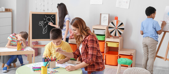 Drawing teacher giving lessons at school