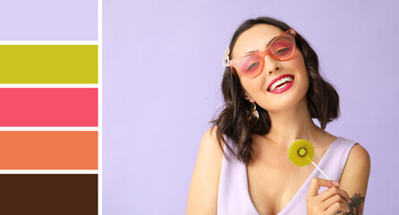 Beautiful young woman with lollipop on lilac background. Different color patterns