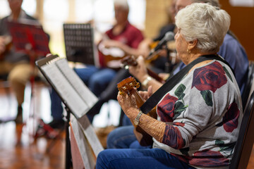 group of seniors playing musical instruments