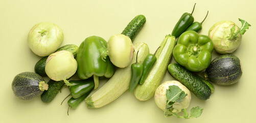 Assortment of fresh vegetables on light green background