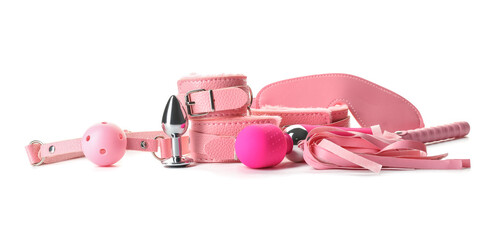 Different toys from sex shop on white background