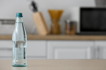 Bottle of clean water on kitchen table