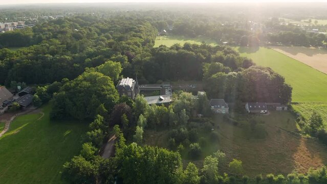 Historical Country House Of Broekbergen Surrounded With Wide And Rich Greenery In Driebergen, Netherlands. Aerial Pullback