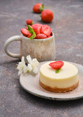 Cheesecake with strawberries. Shallow depth of field