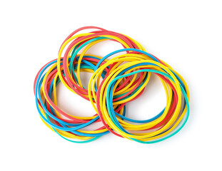 Many colorful rubber bands on white background
