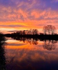 Obraz premium sunset over the river