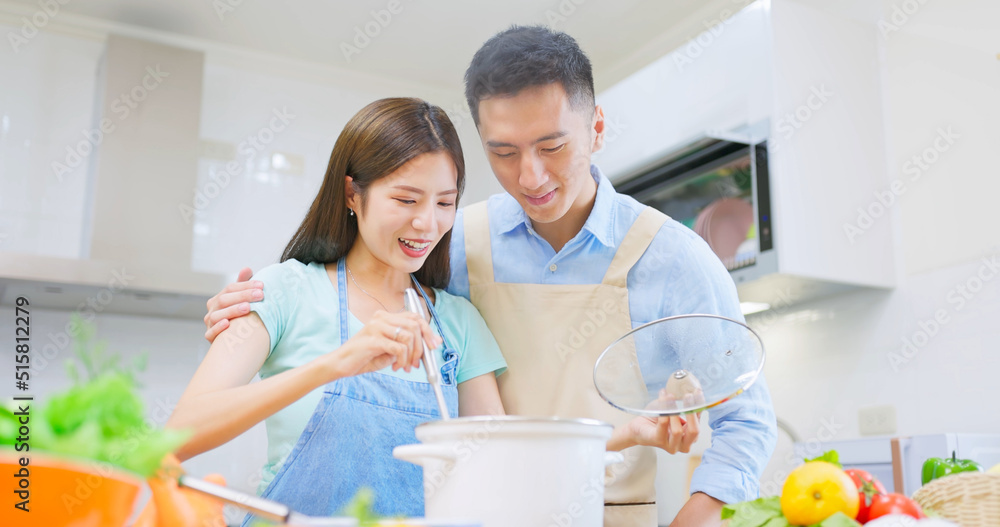 Sticker young couple are cooking together