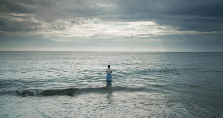 woman walking at beach