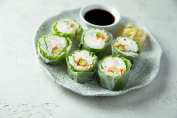Healthy green sushi rolls with shrimps