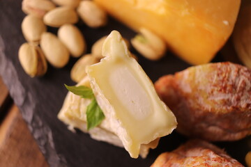 different types of goat and cow cheeses close-up