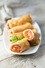 Homemade crepes with salmon and cream cheese