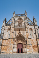 Entrance portal and Gothic facade of the Monastery of Santa Maria da Vitória in Batalha, PORTUGAL