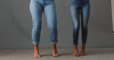 Close up waist down two girls dancing bare foot