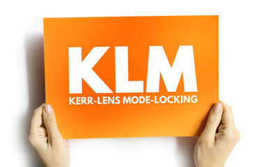 KLM - Kerr lens mode locking acronym on card, abbreviation concept background