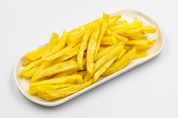 Fried potatoes. French fries isolated on white background. French fries served on a plate. close up
