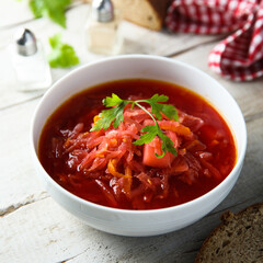 Traditional homemade beetroot soup with fresh parsley