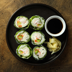 Healthy green sushi rolls with shrimps