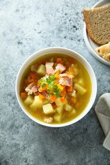 Homemade pea soup with smoked bacon