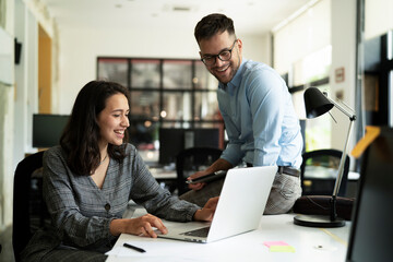 Colleagues in office. Businesswoman and businessman discussing work in office
