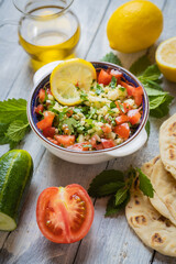 Lebanese tabbouleh salad with bulgur, parsley, tomato and cucmber