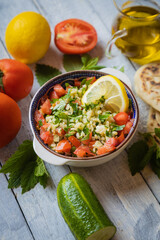 Lebanese tabbouleh salad with bulgur, parsley, tomato and cucmber