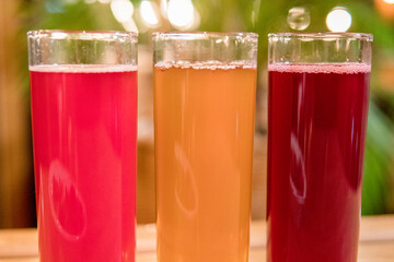 forest berry compotes with freshly frozen berries on the background